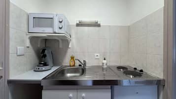 Microwave, stovetop, coffee/tea maker, toaster