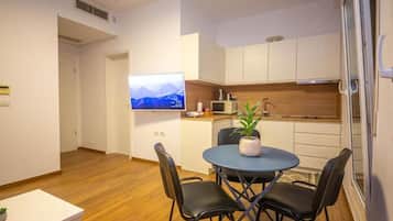 Apartment, 1 Bedroom, City View | Private kitchen | Fridge, microwave, stovetop, espresso maker