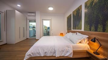 Apartment, 2 Bedrooms, Balcony, City View | Desk, blackout drapes, iron/ironing board, free WiFi