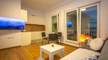 Apartment, 1 Bedroom, City View | Living area | 41-inch flat-screen TV with cable channels, Netflix, streaming services