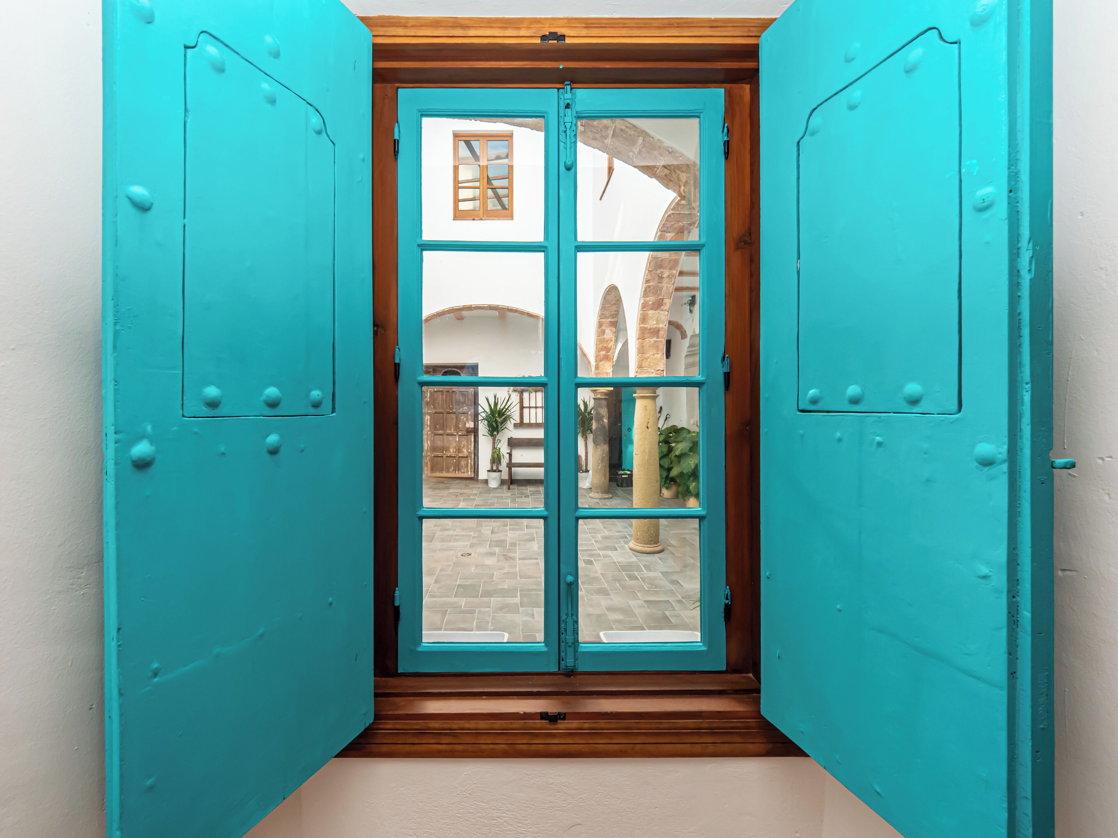 Departamento Deluxe, vista al patio | Ropa de cama de alta calidad y camas con efecto memoria 