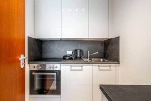 Fridge, oven, toaster, cookware/dishes/utensils - Studio 4* with balcony and parking in Bel Air (Luxembourg)