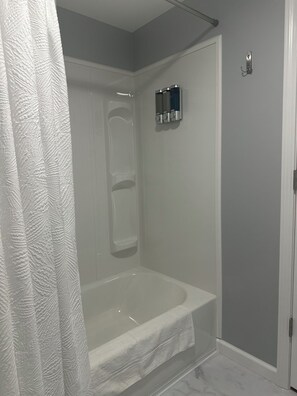 Hair dryer, towels, soap, shampoo