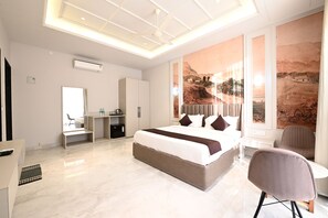 Deluxe Room, Balcony | Desk, laptop workspace, free WiFi