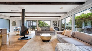 Smart TV, fireplace - Chic Southampton Retreat with Heated Pool, Lush Gardens & Resort-Style... (Southampton)