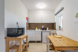 Fridge, microwave, electric kettle, toaster