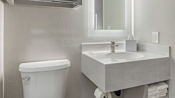 Combined shower/bathtub, hair dryer, towels, soap