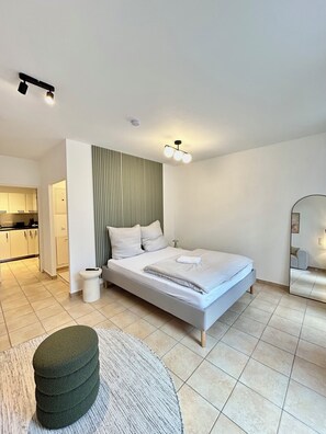 1 habitación, tabla de planchar con plancha, wifi gratis y ropa de cama 