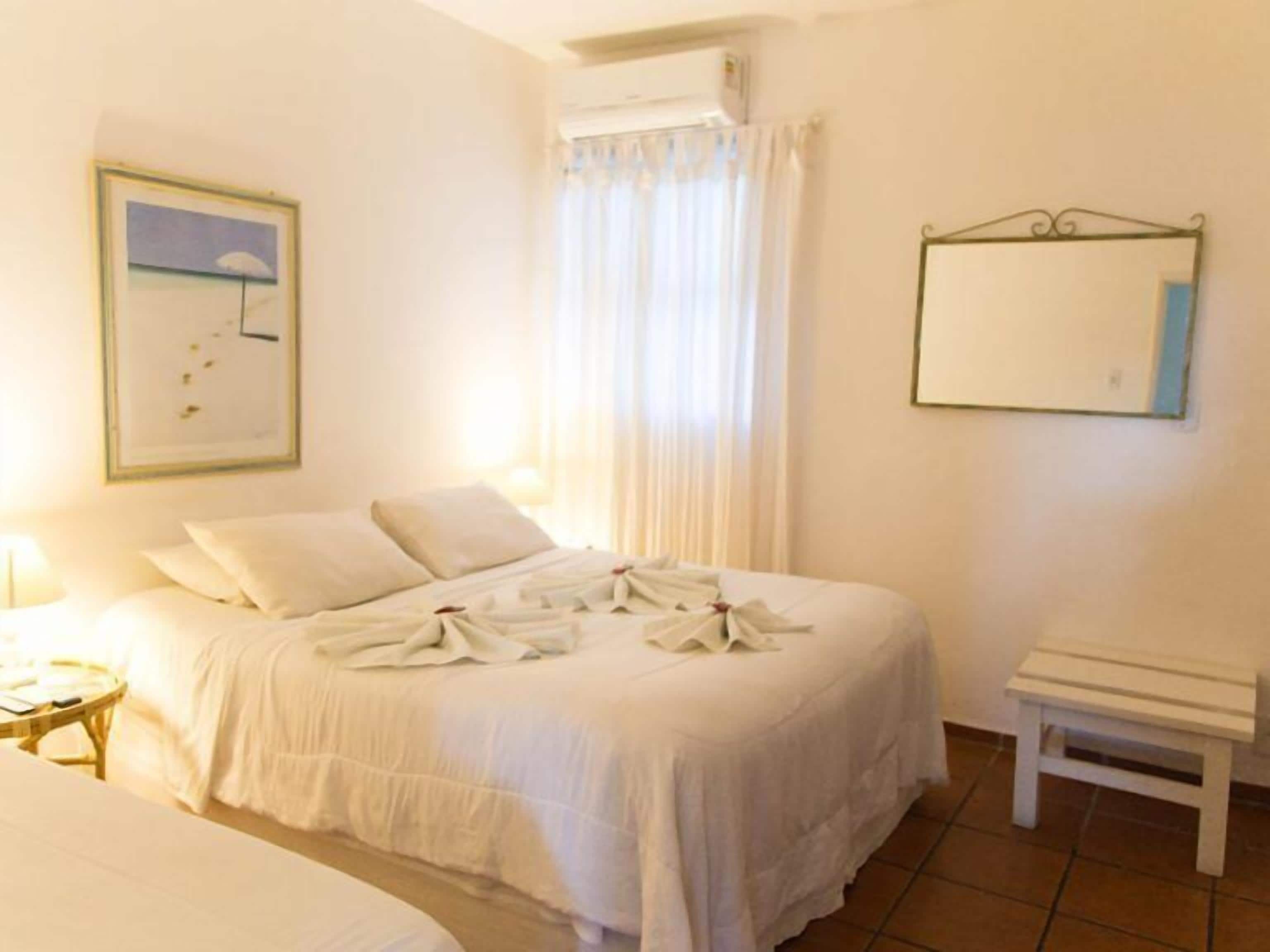 Standard Quadruple Room | In-room safe, free WiFi