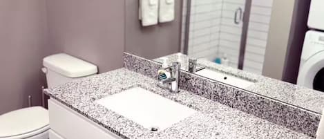 Hair dryer, towels, soap, toilet paper
