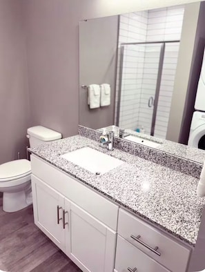 Hair dryer, towels, soap, toilet paper