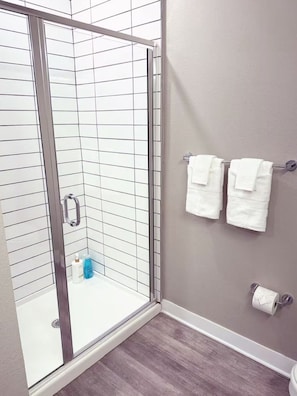 Hair dryer, towels, soap, toilet paper