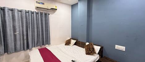 Deluxe Double Room, City View | In-room safe, blackout drapes, soundproofing, iron/ironing board