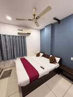 Deluxe Double Room, City View | In-room safe, blackout drapes, soundproofing, iron/ironing board
