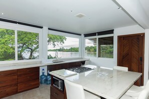 Fridge, microwave, stovetop, coffee/tea maker - 2 Bedroom Waterfront Retreat w/ Dock Close to Dining, Diving, and Westend (West End)