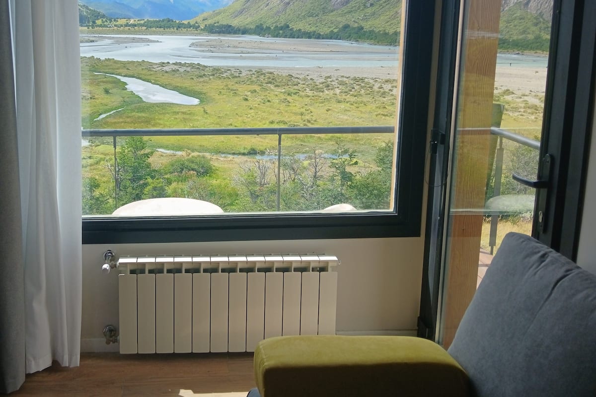 Premium Apartment, Mountain View | Living area | 32-inch Smart TV with digital channels