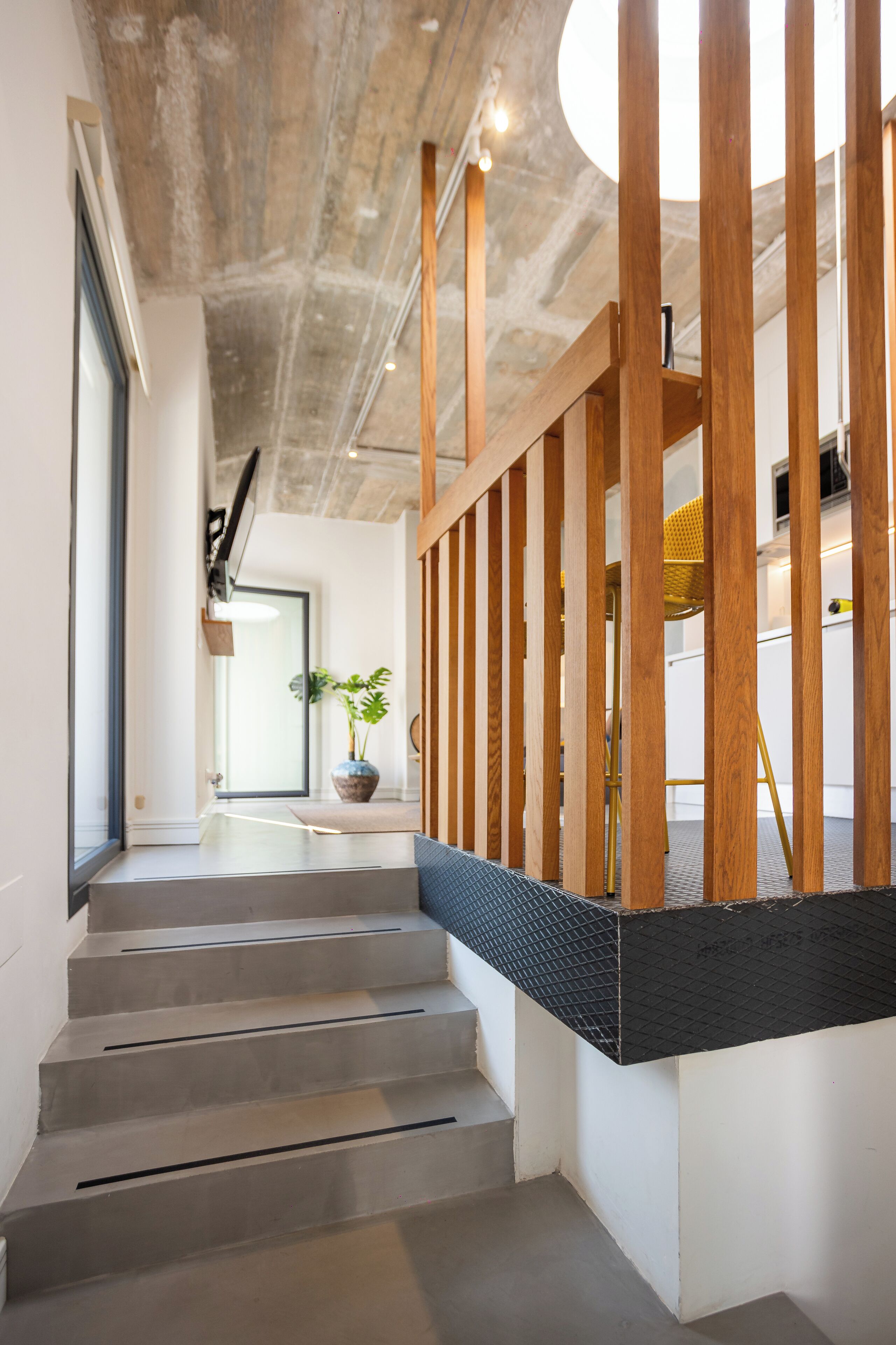 Panoramic-Apartment, Stadtblick | Wohnbereich | Fernseher