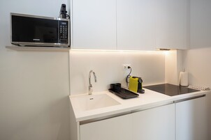 Fridge, microwave, cookware/dishes/utensils