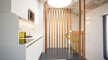 Panoramic Apartment, City View | Private kitchen | Fridge, microwave, cookware/dishes/utensils