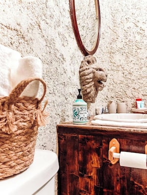 Shower, towels, soap, toilet paper