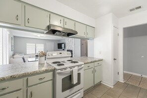 Fridge, microwave, oven, stovetop - 2BR King, Private Fenced Yard w/Turf, Grill, Dog Friendly, Near Pensacola Beach (Gulf Breeze)