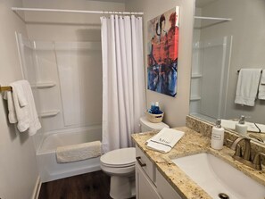 Hair dryer, towels, soap, toilet paper