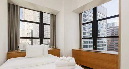Wall Street Retreat | Kitchen & Gym | Brooklyn Bridge Views from Downtown
