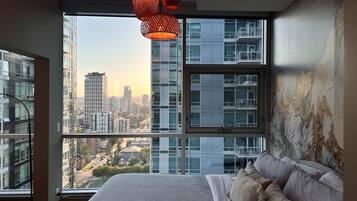 1 bedroom, desk, iron/ironing board, travel crib