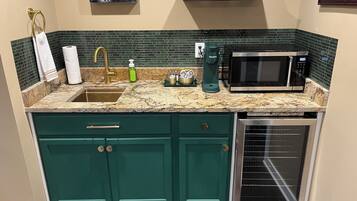 Fridge, microwave, coffee/tea maker, toaster