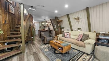 Smart TV, fireplace, books, stereo