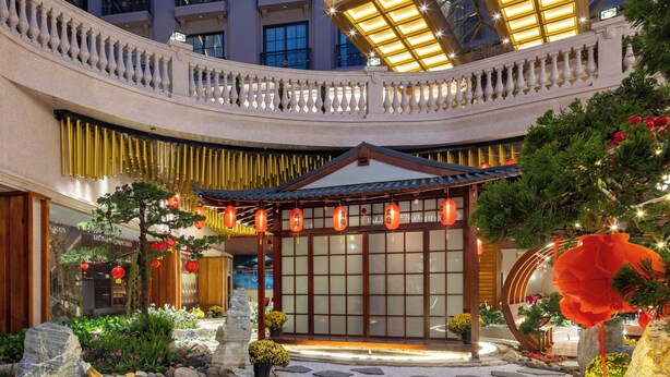 A hotel entrance with traditional Asian architecture, a stone pathway, and a well-maintained garden. - Best Western Premier Imperial Dalat (Lam Vien - Da Lat)