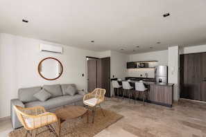 Design Apartment, 2 Bedrooms, Private Pool, Tower | Living area | 50-inch Smart TV with satellite channels - Artra - modern comfort with pool (Tulum)