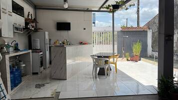 Fridge, microwave, cookware/dishes/utensils