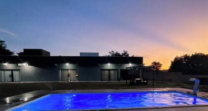 Property with HEATED POOL in a gated community, 55 minutes from Belo Horizonte.
