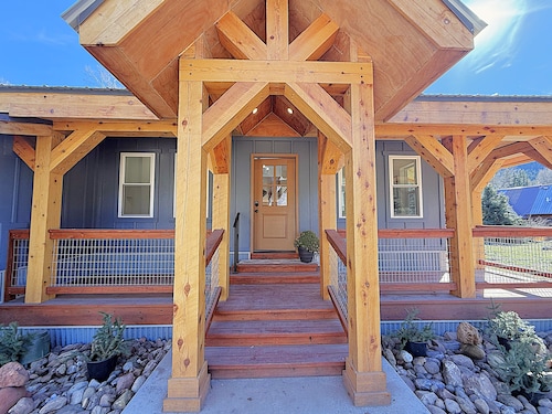 Riverfront Escape with Large Yard & Relaxing Deck Views