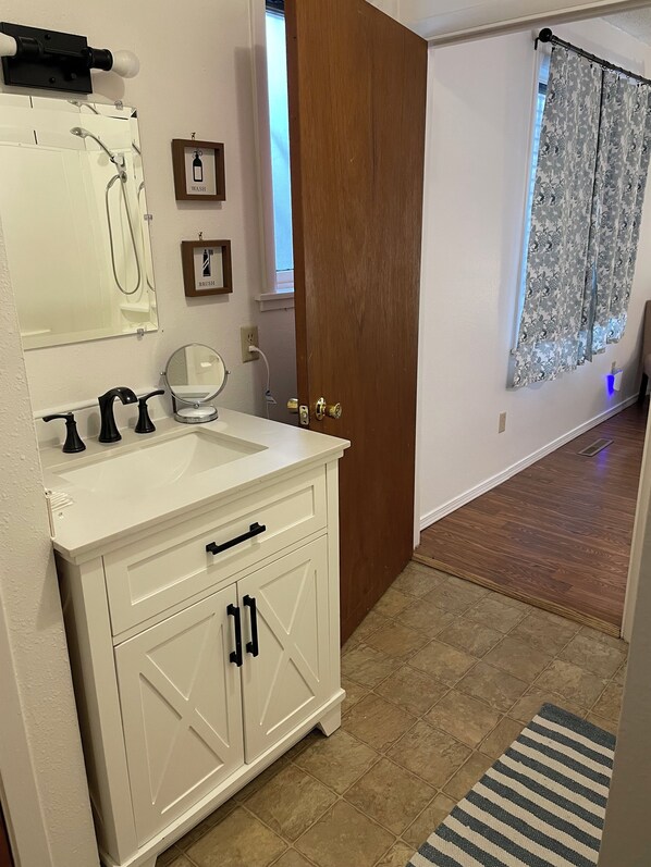 Hair dryer, towels, soap, shampoo