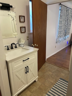 Hair dryer, towels, soap, shampoo