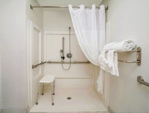 Traditional Room, 1 King Bed, Roll-in Shower | Bathroom | Hair dryer, towels, soap, shampoo - The Windstar Hotel - Near Emerald Isle (Cedar Point)