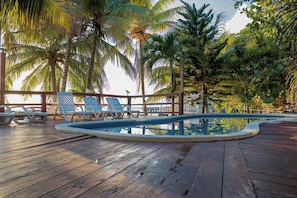 Pool - West Bay • King Bed • Kitchen • Living Room • Pool (West Bay)