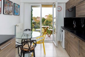 Apartment | Private kitchen | Cleaning supplies