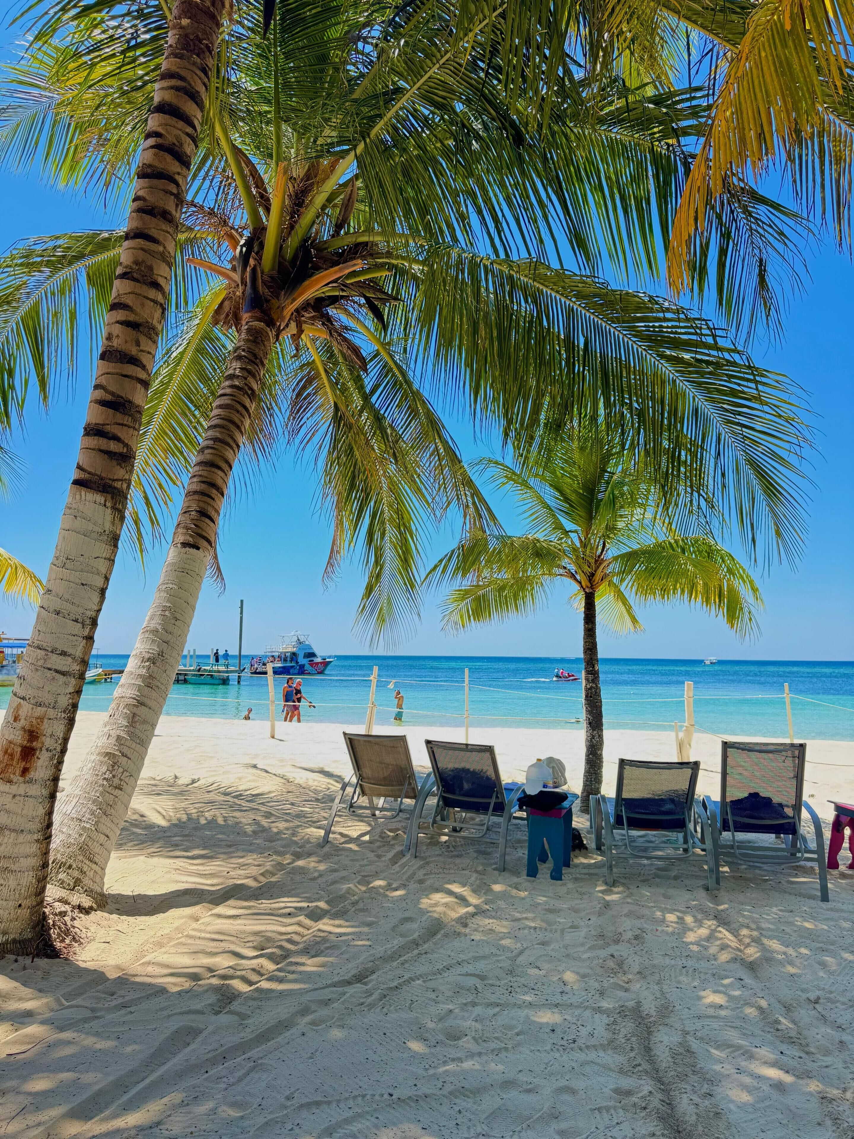 On the beach, sun-loungers, beach towels