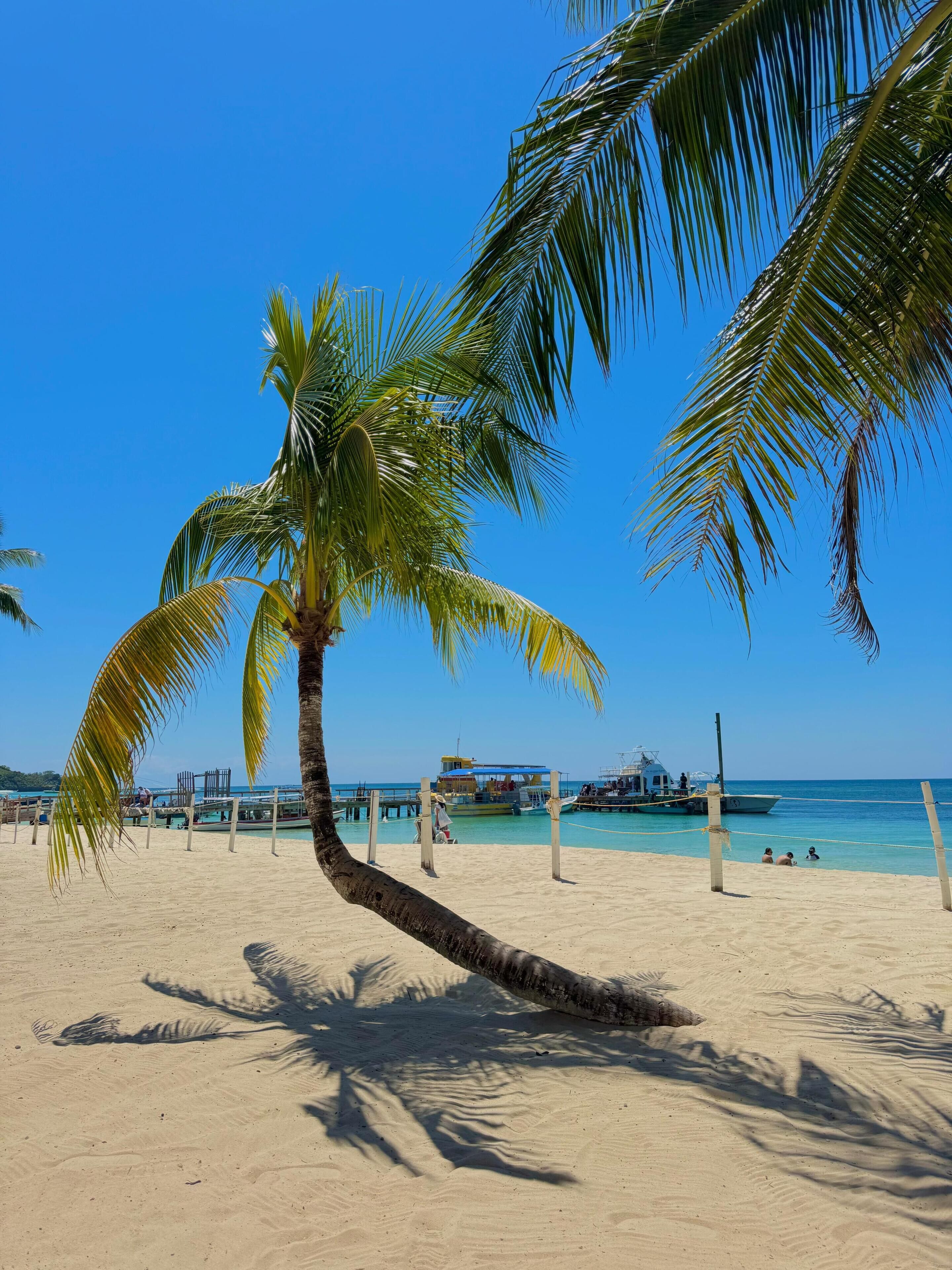 On the beach, sun-loungers, beach towels