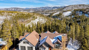 A mountain lodge with multiple buildings, surrounded by snow-covered trees and mountains. - Skate Bowl, Climbing Wall, Arcade Breckenridge Adventure Chalet by Avantstay (Breckenridge)