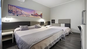 A hotel room with two beds, a large cityscape painting on the wall, and a desk with a chair. - Relax Hotel Acquaviva - Tuscany Hills (Casole d'Elsa)