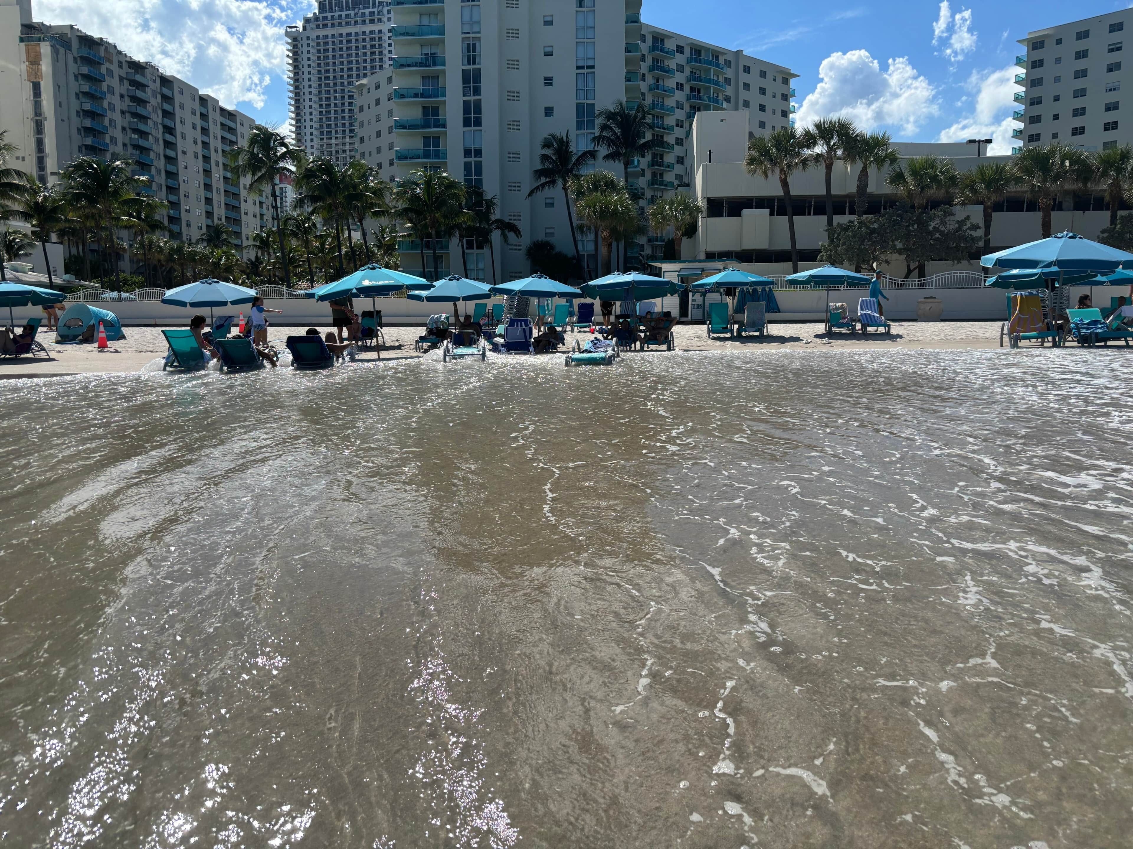 On the beach, sun loungers, beach towels