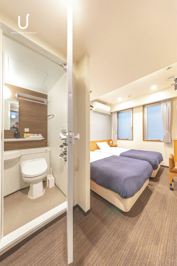 Twin Room | Bathroom | Combined shower/tub, hair dryer, towels, soap - unito hotel residence Kyoto Station North (Kyoto)