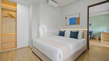 Apartment, 2 Bedrooms, City View | Desk, laptop workspace, iron/ironing board, free WiFi