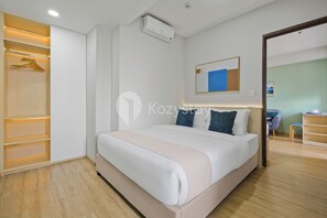 Apartment, 2 Bedrooms, City View | Desk, laptop workspace, iron/ironing board, free WiFi