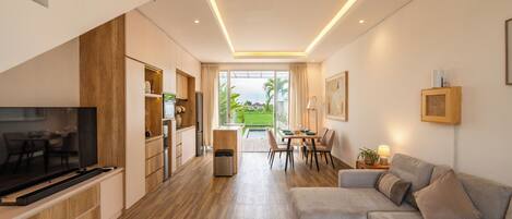 Villa Deluxe, vue piscine | Salle de séjour