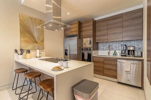 Fridge, microwave, oven, stovetop - Sunshine | El Tezal Luxury Penthouse Condo Cabo (El tezal)